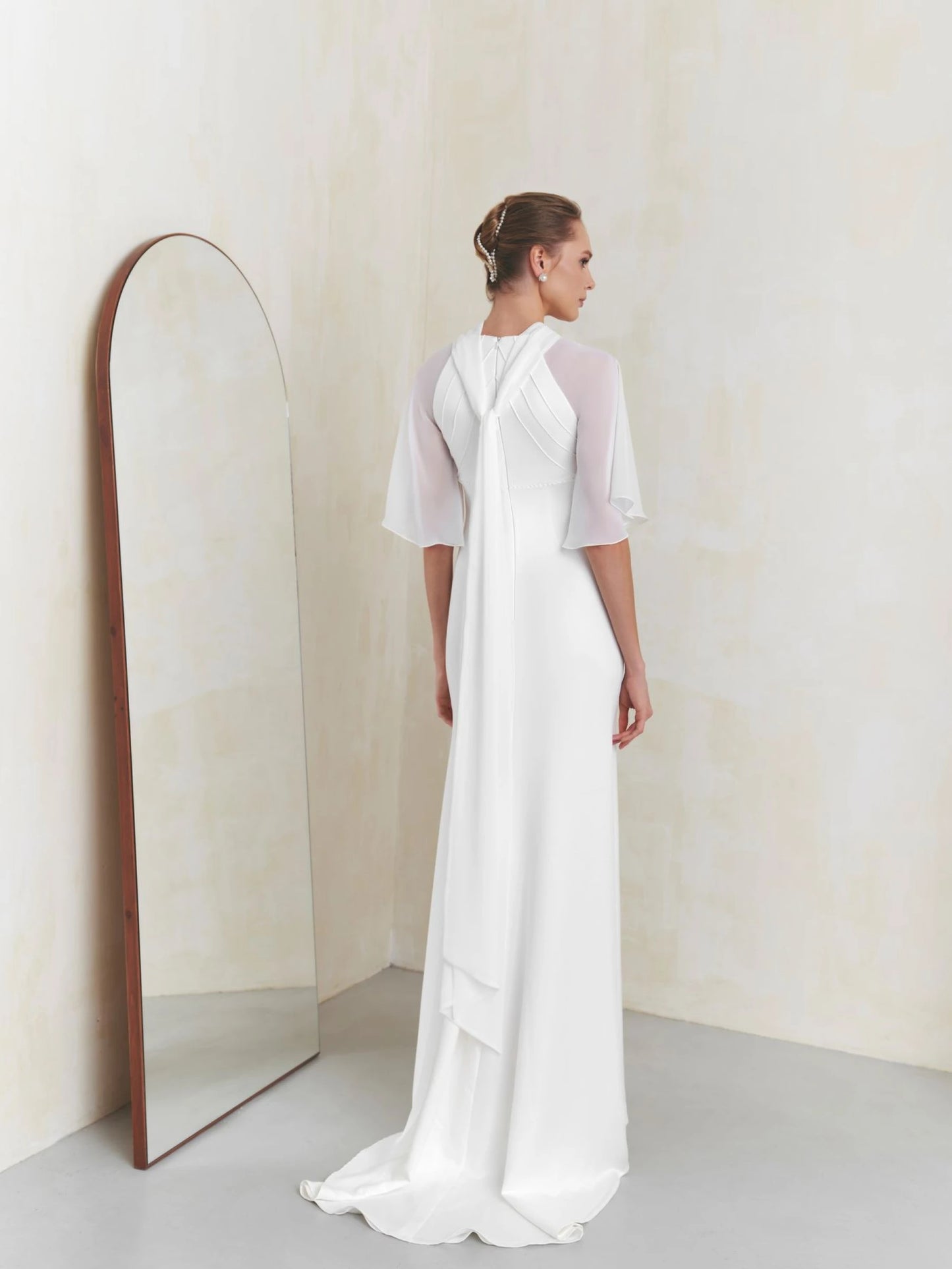 Back view of Silk Star dress by Liretta with chiffon collar tied bow detail