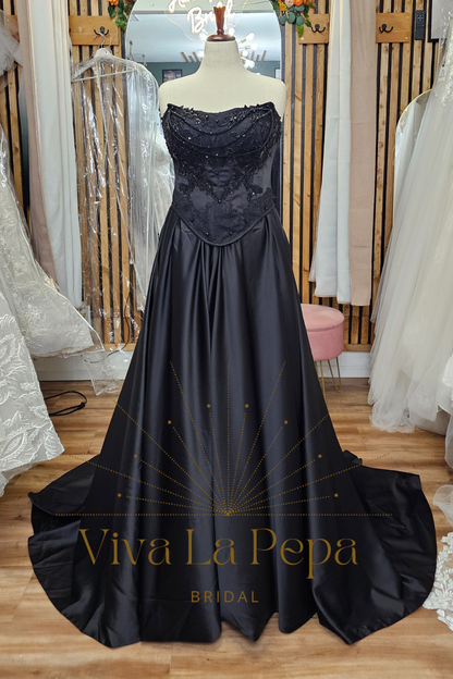 Raven’s Whisper black bridal gown with beaded lace corset overlay and strapless satin skirt