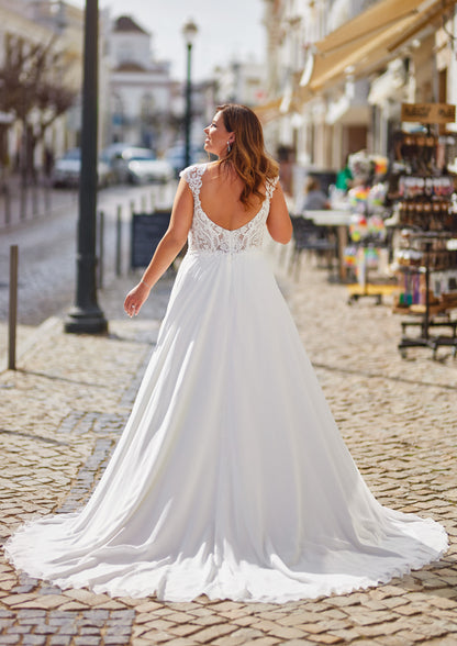 Mirelle plus size chiffon wedding gown with lace V-back, flowing A-line skirt and bridal train