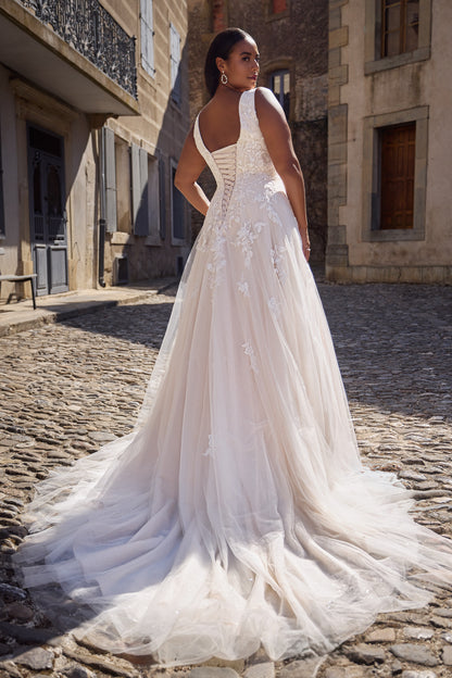 Orlena Très Chic plus size lace wedding dress with lace-up corset back, glitter tulle A-line skirt and sweeping train