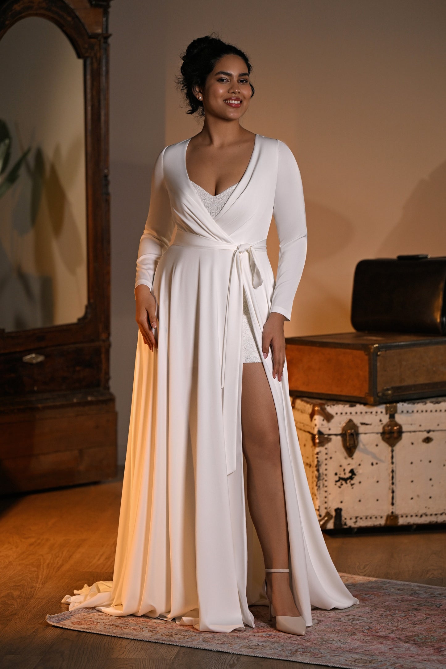 Lakvena two-piece wedding dress—long-sleeve wrap gown with slit over sparkle lace mini by Kookla