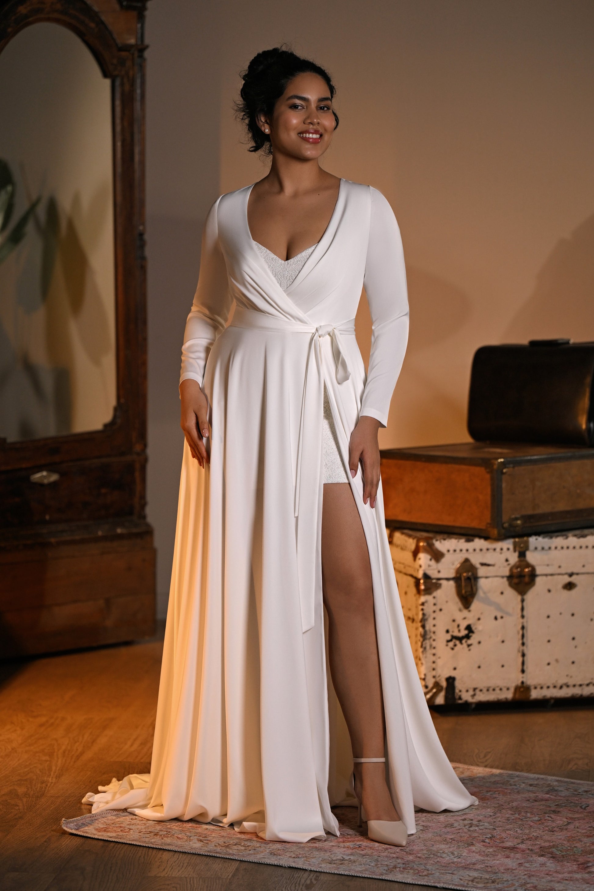 Lakvena two-piece wedding dress—long-sleeve wrap gown with slit over sparkle lace mini by Kookla