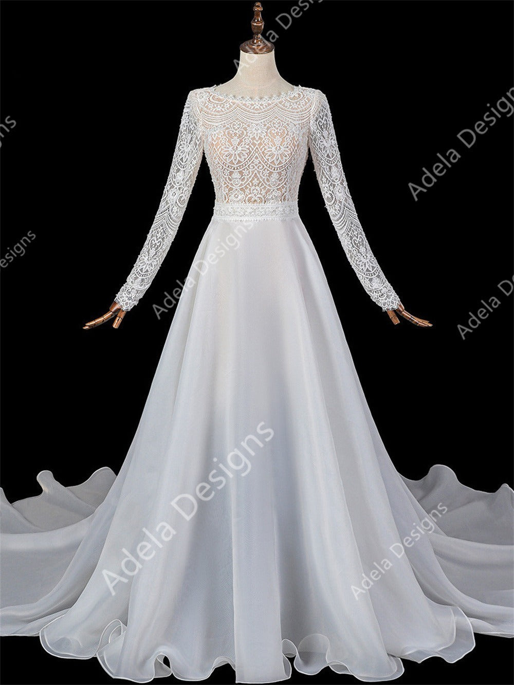 Marthe 2-piece lace wedding dress with long sleeves and detachable full overskirt.