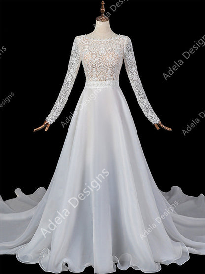 Marthe 2-piece lace wedding dress with long sleeves and detachable full overskirt.
