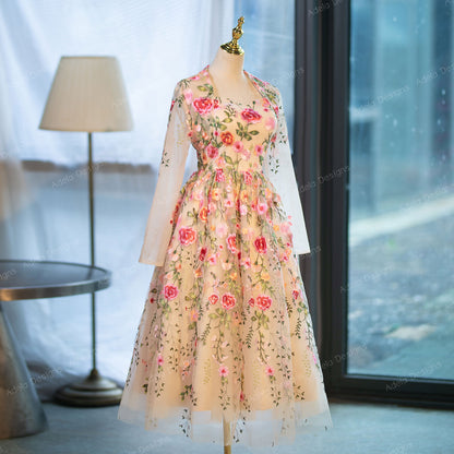 Floral embroidered tea-length bridal gown with optional sheer sleeves and square-sweetheart bodice.