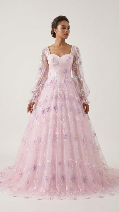 Winifred pink celestial star wedding dress with long sheer sleeves and ball gown skirt