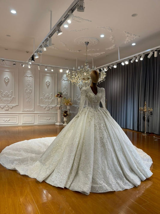 Stunning V Neck Princess Full Ballgown Sparkley Rhinestones Wedding Dress Bridal Gown Long Sleeves Lace Appliqued Illusion Sides Pleates