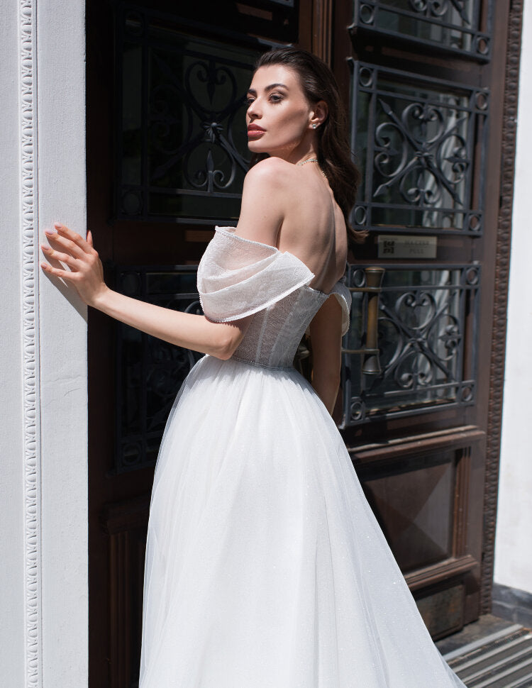 Stunning Off-Shoulder Wedding Dress with Puff Sleeves and Beaded Corset Bodice - Elegant Tulle A-Line Bridal Gown for Fairytale Weddings