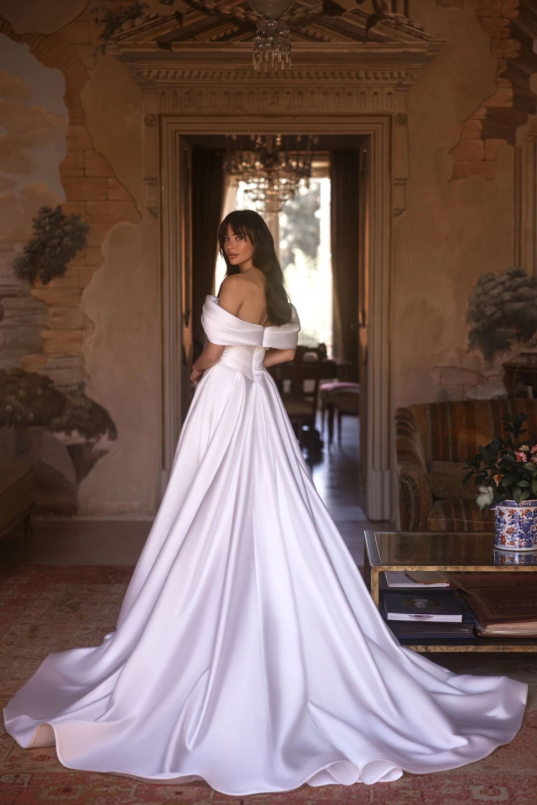 Elegant Aline Off-Shoulder Mikado Satin Wedding Dress with Basque Waist, Featuring Dramatic Train and Structured Gathered Waist Design