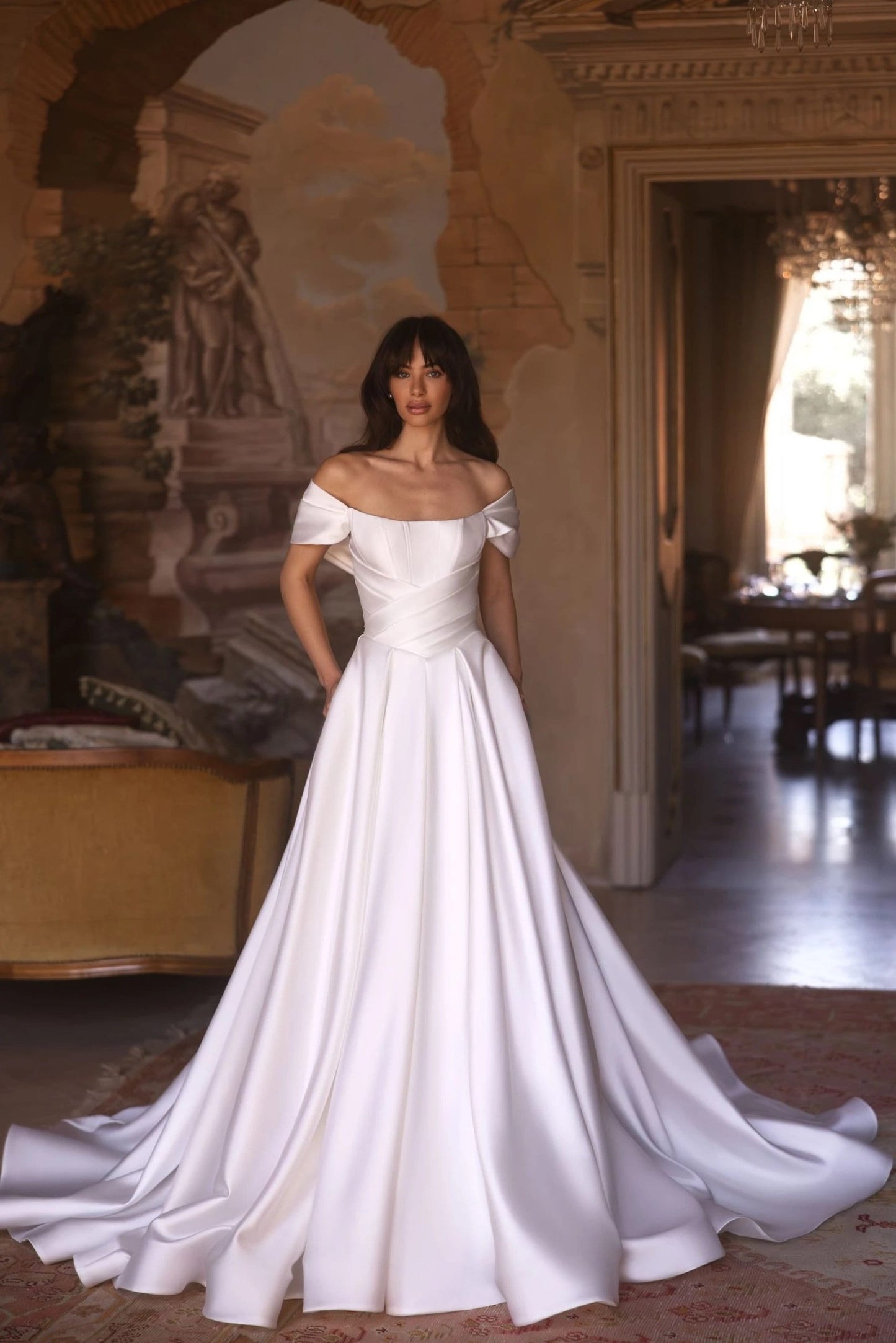 Elegant Aline Off-Shoulder Mikado Satin Wedding Dress with Basque Waist, Featuring Dramatic Train and Structured Gathered Waist Design