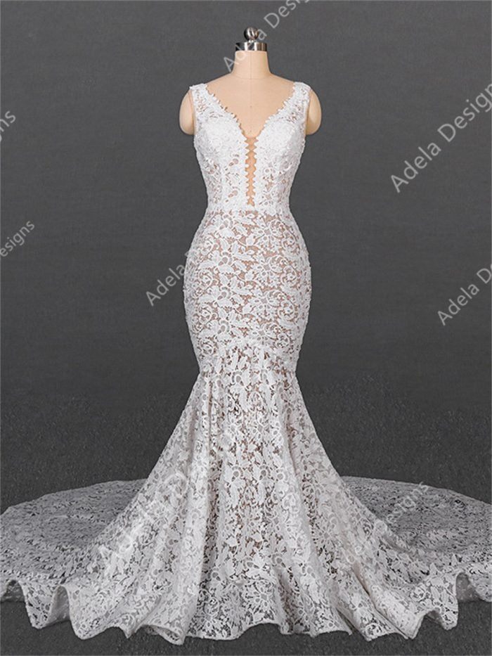 Alma mermaid lace wedding dress with plunging V-neck and chapel-length train, boho bridal gown.