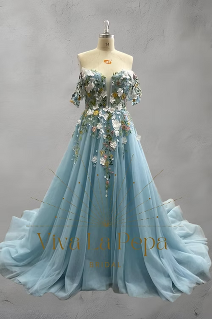 Front view of Celestial Garden gown by Viva La Pepa featuring blue embroidered tulle
