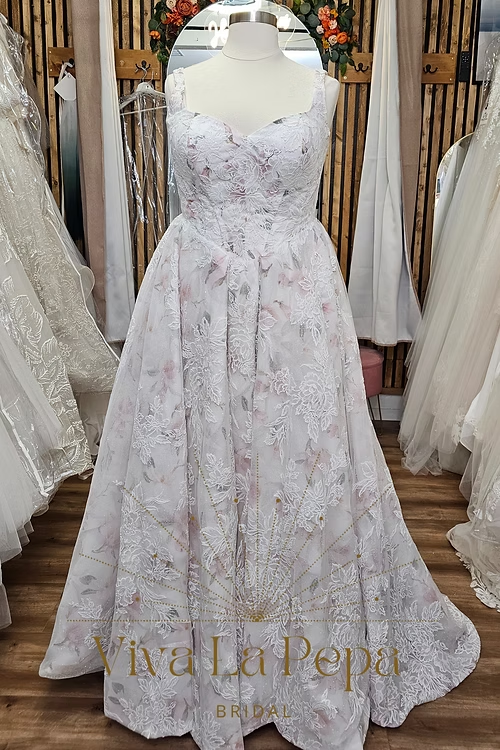 Front view of Blooming Grace blush floral lace A-line wedding dress by Viva La Pepa