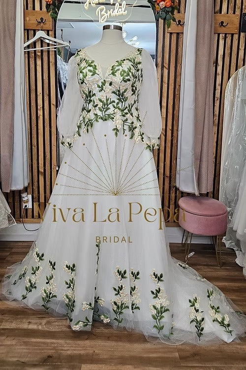 Front view of Bryony floral embroidered wedding dress with sleeves