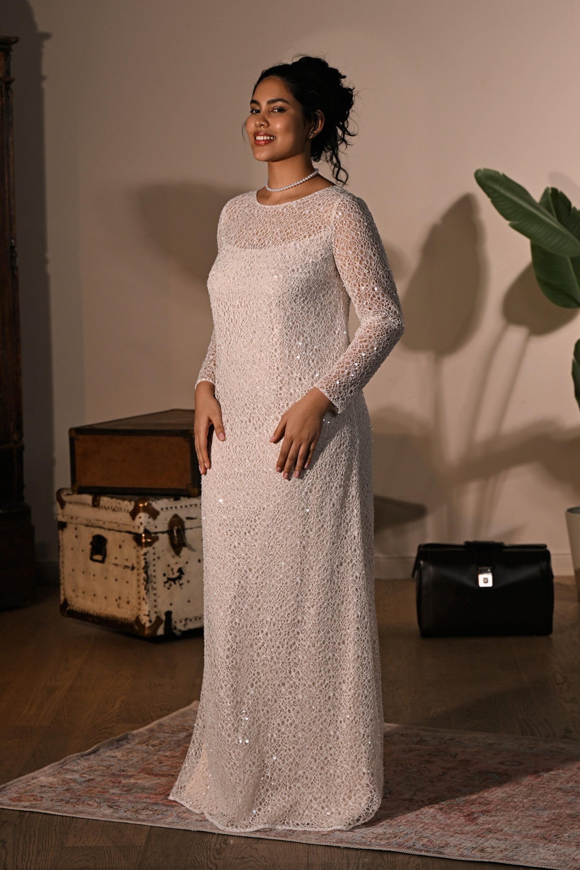 Liticia long-sleeve sequin lace wedding dress with bateau neckline and sheath silhouette by Kookla