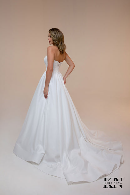 Kira Nova Adell minimalist satin ball gown – side and train view