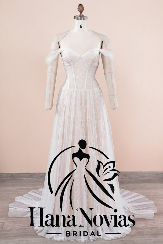 Mia drop-waist off-shoulder tulle A-line wedding dress in light ivory with pleated sweetheart neckline, corset boning and long tulle panels — front view