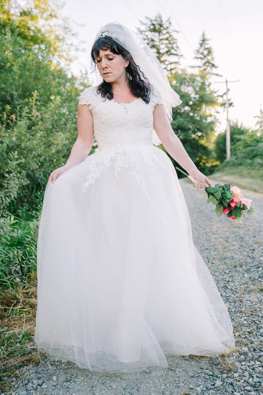 Bridal ball gown wedding dress featuring pearls White