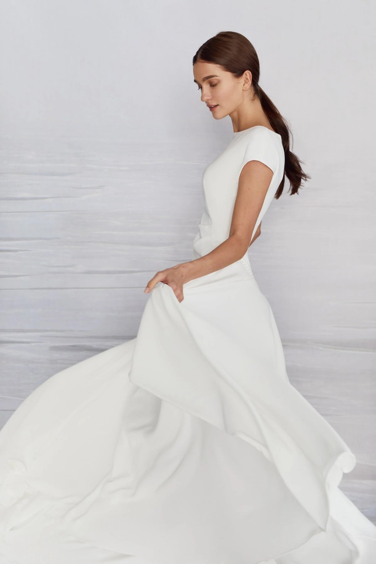 Modest Minimalist Dream Wedding Dress Bridal Gown Flattering Gathered Waist Pearl Details High Neckline Covered Back Short Sleeve LDS Train