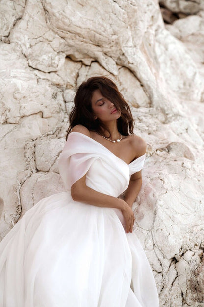 Elegant Off the Shoulder A-Line Wedding Dress Timeless Bridal Gown Straight Neckline Open Back Beautiful Flowing Train