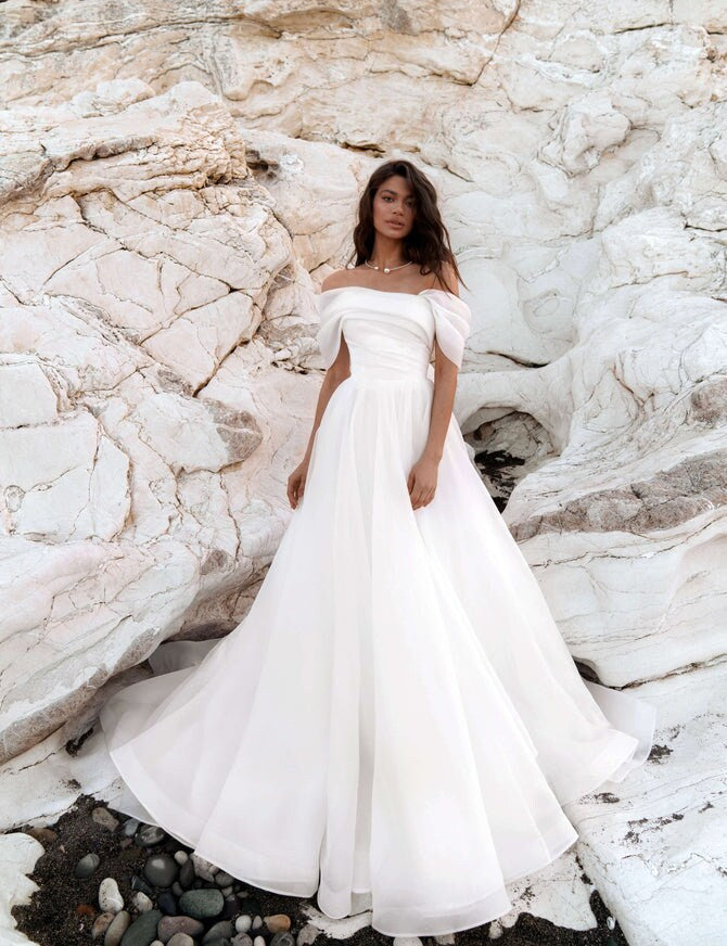 Elegant Off the Shoulder A-Line Wedding Dress Timeless Bridal Gown Straight Neckline Open Back Beautiful Flowing Train