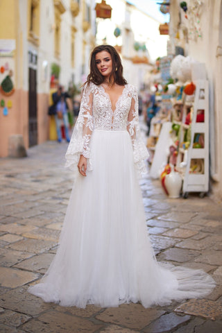 Quintessential Bohemian (boho) Style Wedding Dress Bridal Gown Lace Bodice Deep Plunge Neckline Dramatic Long Bell Sleeves Aline Style