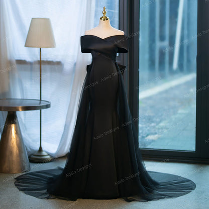 Gothic Black Fit And Flare Mermaid Satin Wedding Dress Bridal Gown Off the Shoulder Neckline Open Back Detachable Train Big Bow in Back