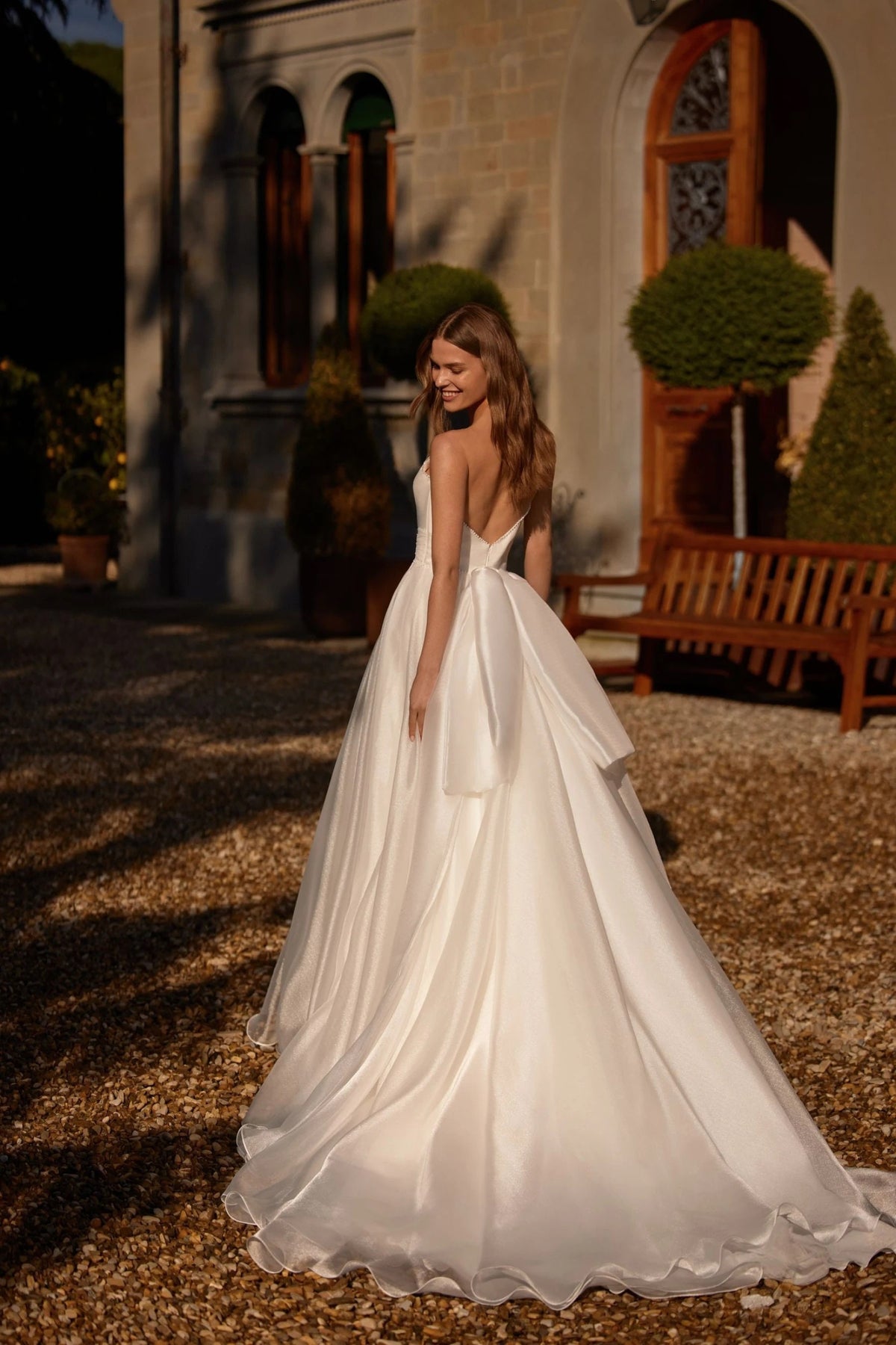 Exquisite Ivory Aline Wedding Dress Bridal Gown Organza with Deep Neckline Pearl Details Open Back Removable Back Bow